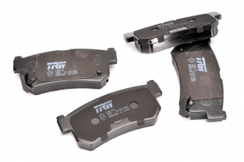 Купить GDB3382 TRW Тормозные колодки задние Карандо (2.3, 2.3 TDiC, 2.9 TD) с звуковым предупреждением износа